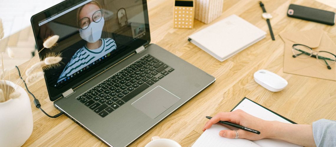 woman-having-video-call-in-home-office-4240610